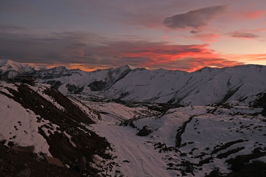 snow covered mountains during daytime in Gudauri Georgia