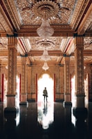 man and woman walking on hallway