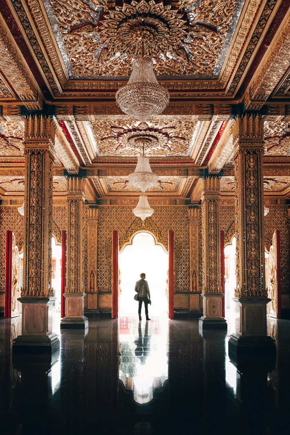 man and woman walking on hallway