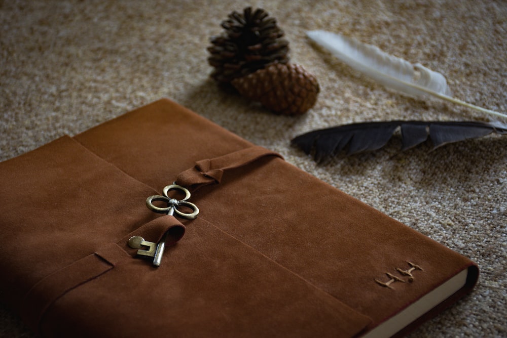 silver and gold rings on brown envelope