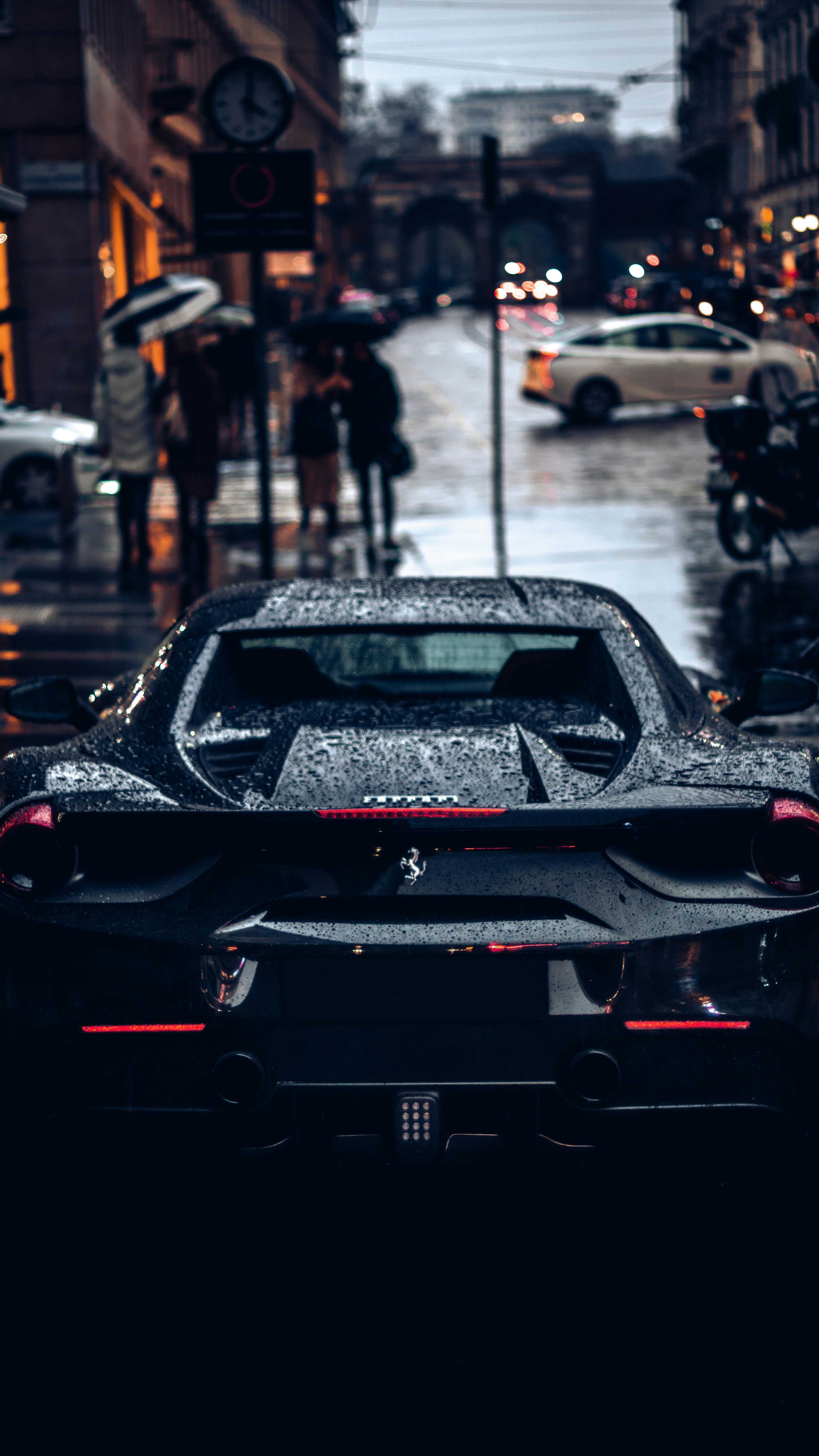 Wallpaper of a Ferrari in the street of Milan