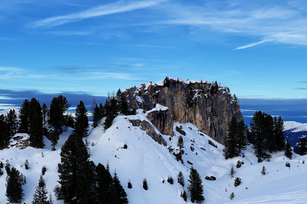 snow covered mountain under blue sky during daytime