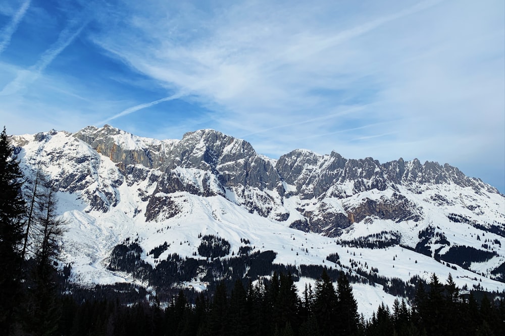 snow covered mountain under blue sky during daytime