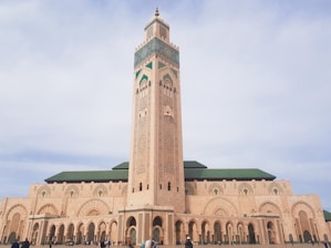 brown concrete building under blue sky during daytime