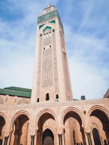 white concrete building under blue sky during daytime