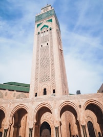 white concrete building under blue sky during daytime