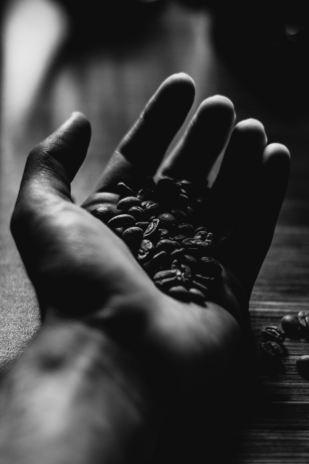 grayscale photo of persons hand