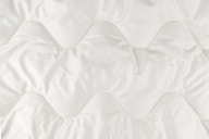 white and gray floral textile