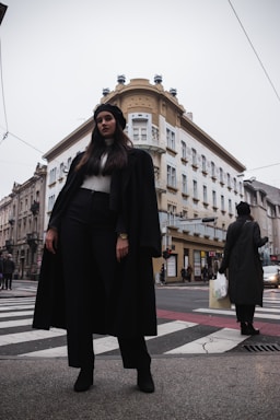 Young woman confidently shopping with stylish clothes and accessories.