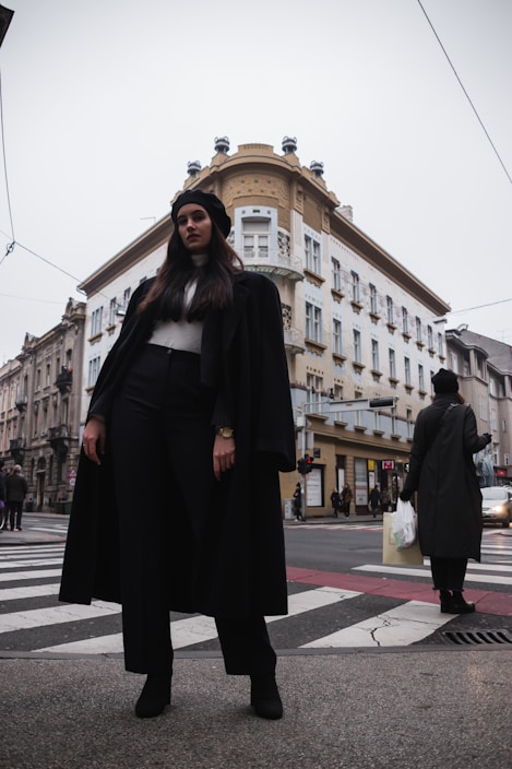 Young woman confidently shopping with stylish clothes and accessories.