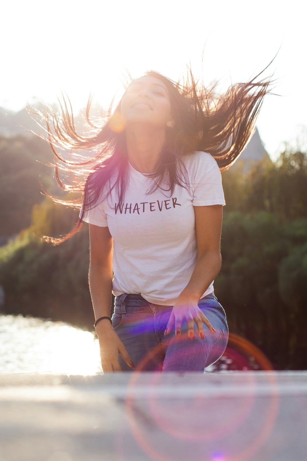 girl in white crew neck t-shirt and purple and pink plaid shorts