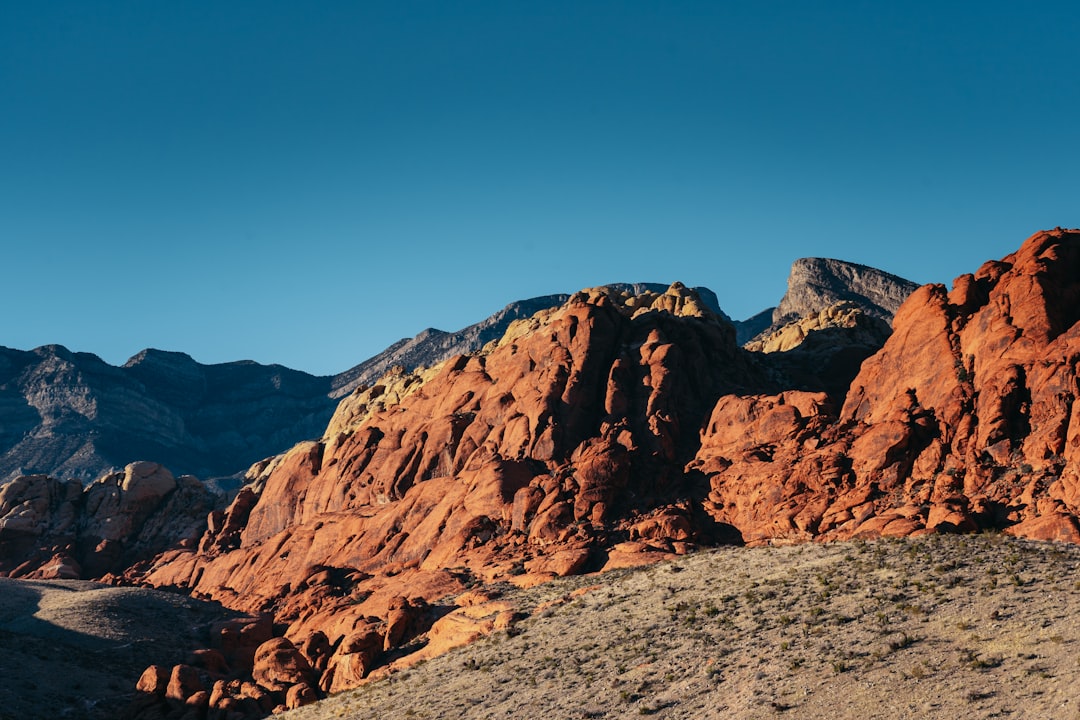 brown rocky mountain under blue sky during daytime