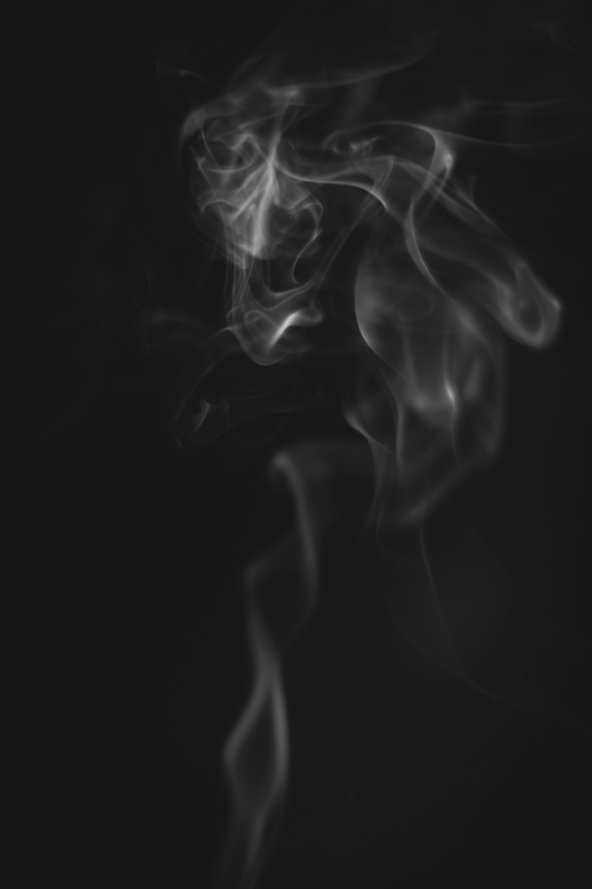 white smoke on black background
