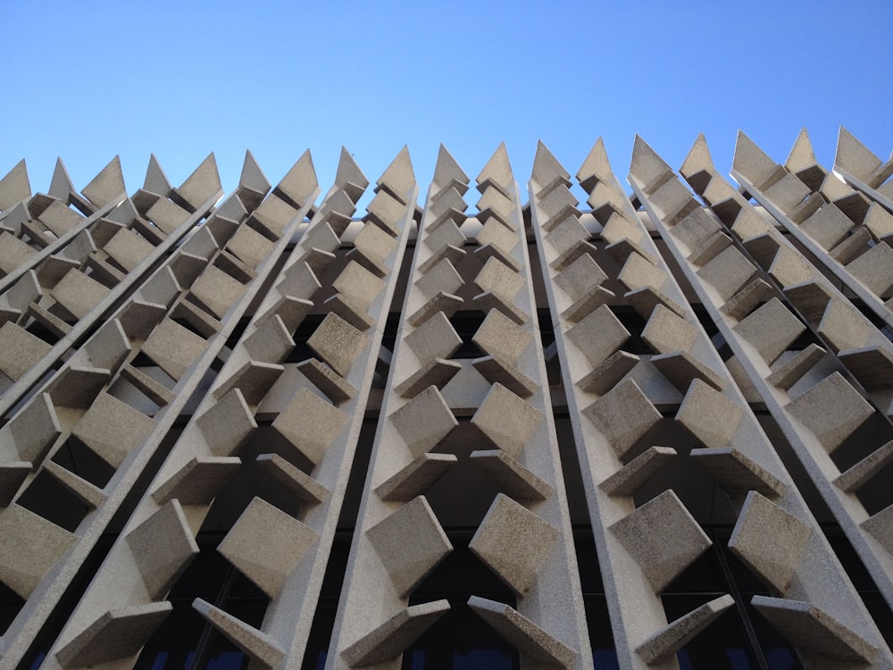 white concrete building under blue sky during daytime