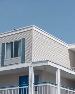Exterior shot of a modern multifamily building in Provo featuring new siding and energy-efficient windows.