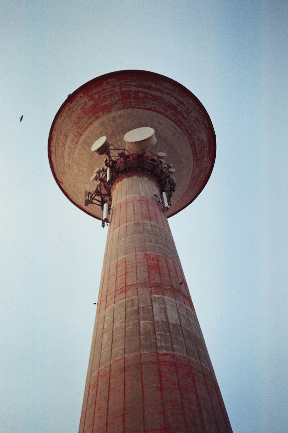 low angle photography of brown and white tower