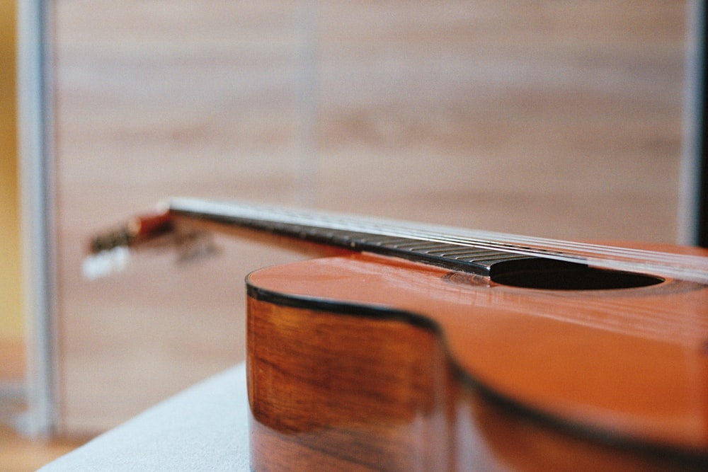 silver and black pen on brown violin