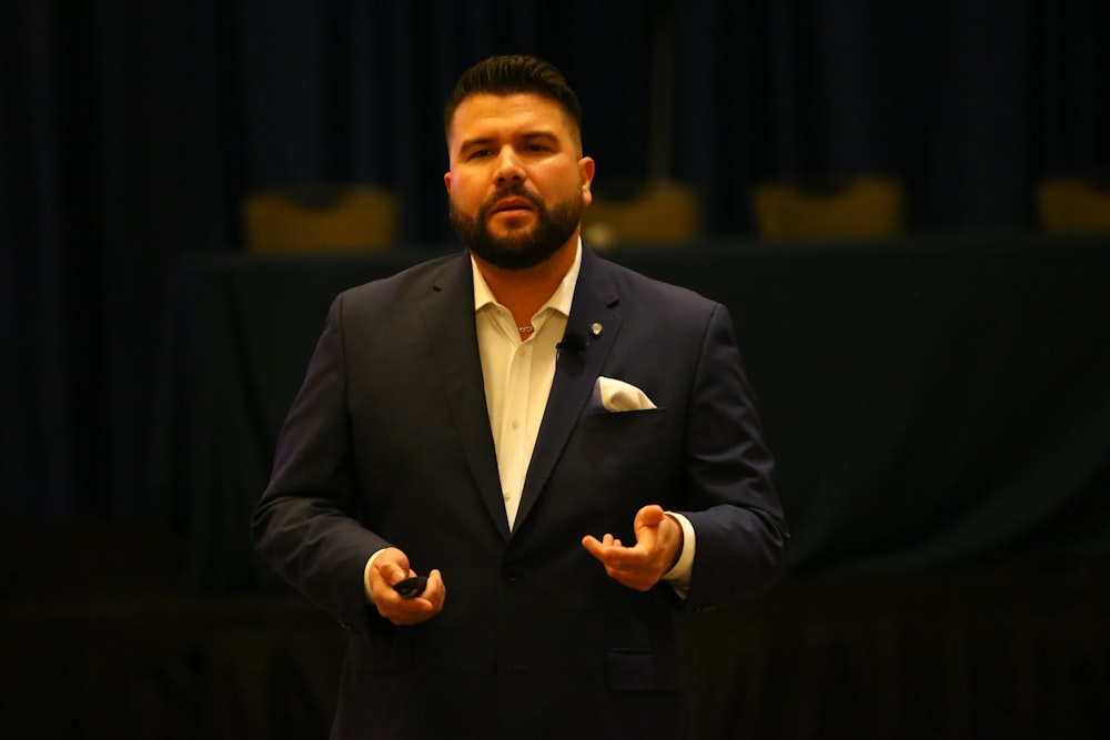 man in black suit jacket