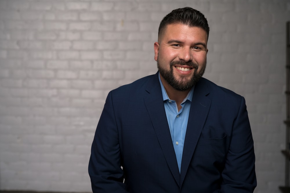 man in blue suit jacket