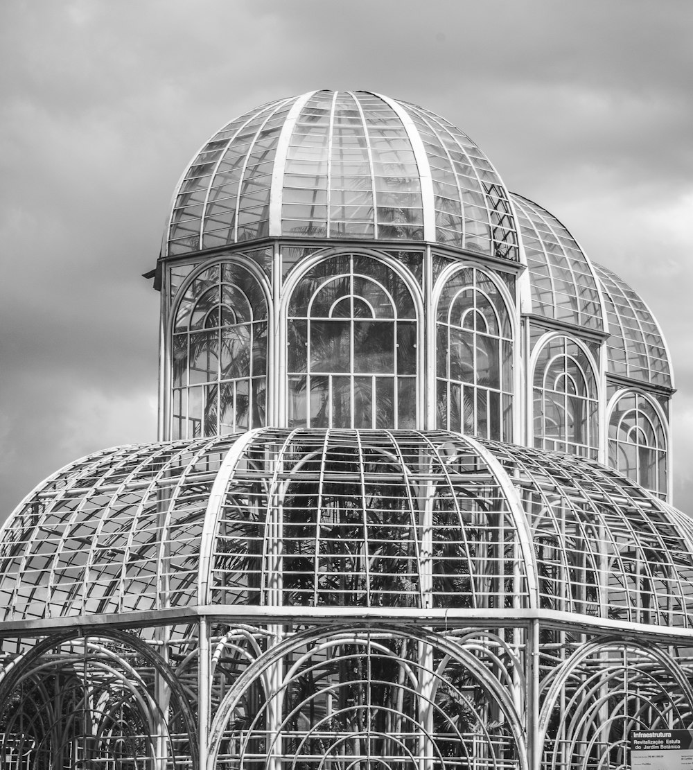 grayscale photo of glass building