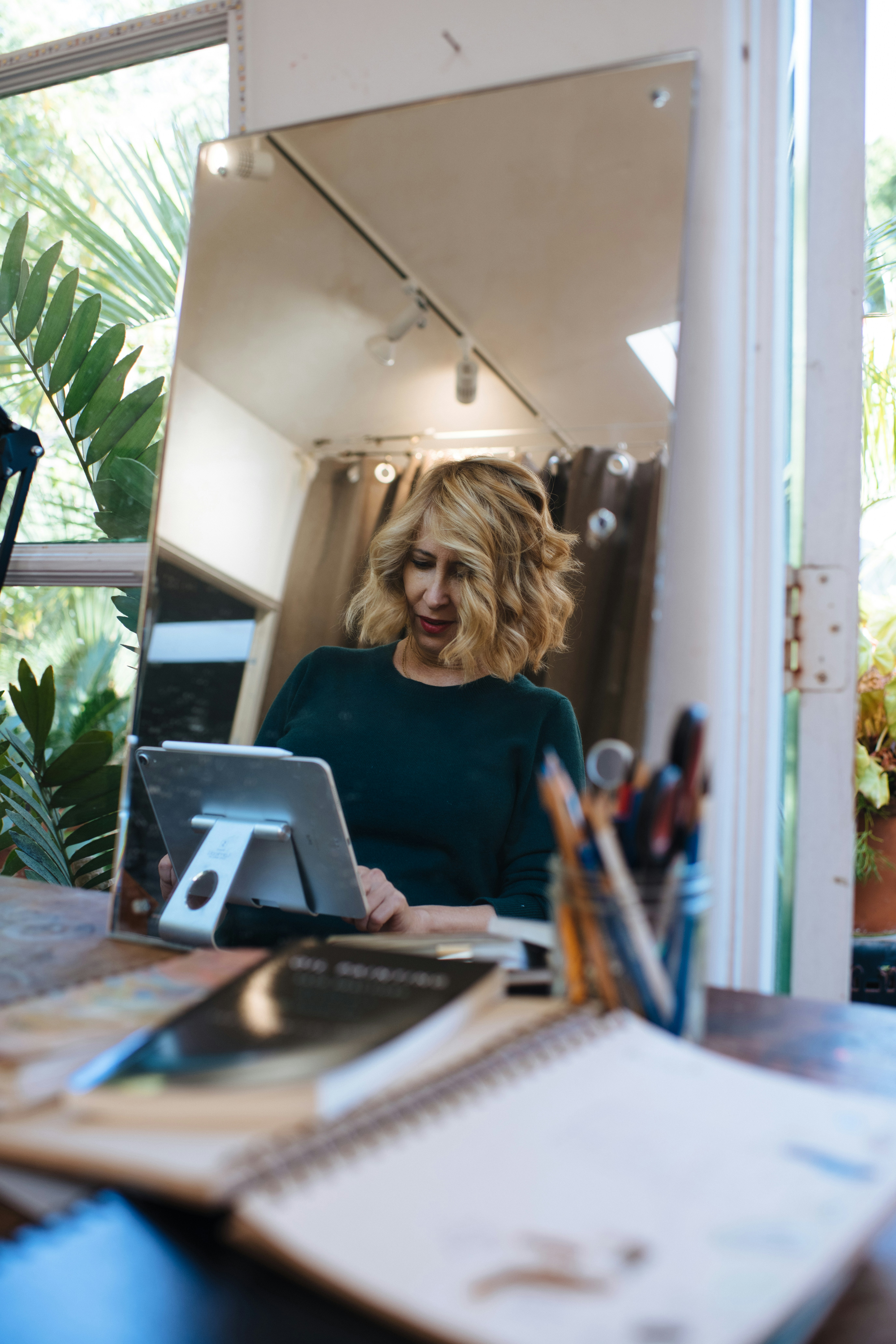 A person looking thoughtfully at a puzzle with a few missing pieces, symbolizing a sudden drop in productivity and the search for understanding.