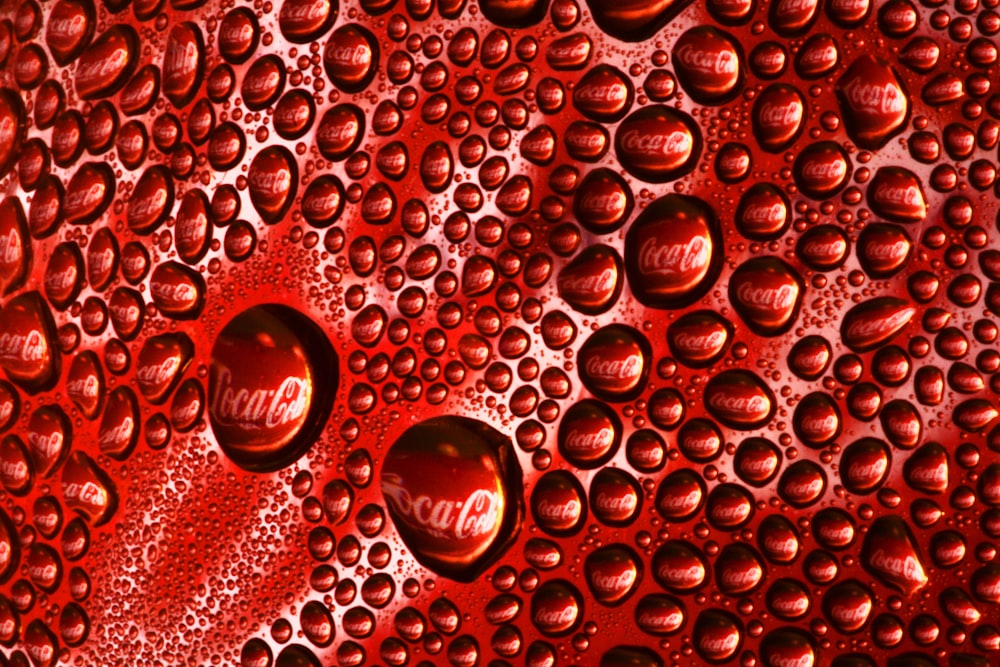 red water droplets on red surface