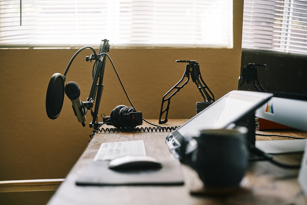 black headphones on white table