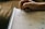 A close-up of hands sketching design concepts on a notepad.