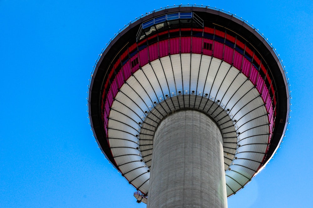 white and red round building