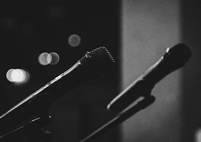 Close-up of two microphones ready for a lively conversation in the radio studio.
