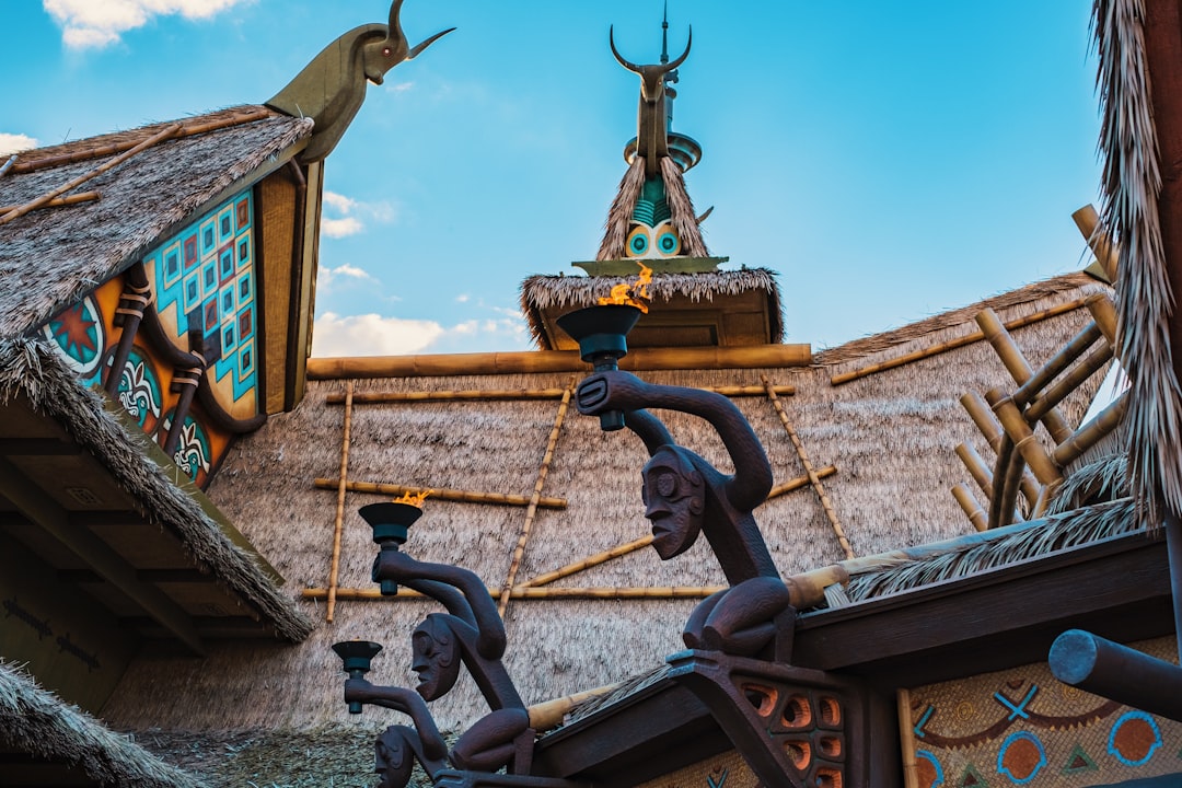 black metal human skeleton figurine, Polynesian themed ornamentation near The Enchanted Tiki Room from a recent trip to 