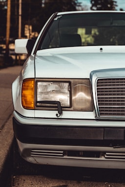 white car with orange and black lights