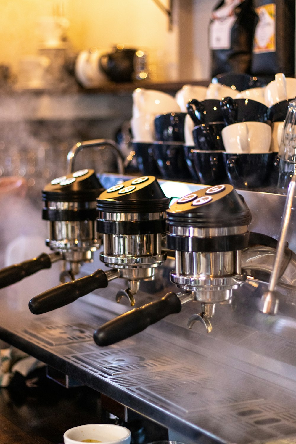 stainless steel espresso machine on table