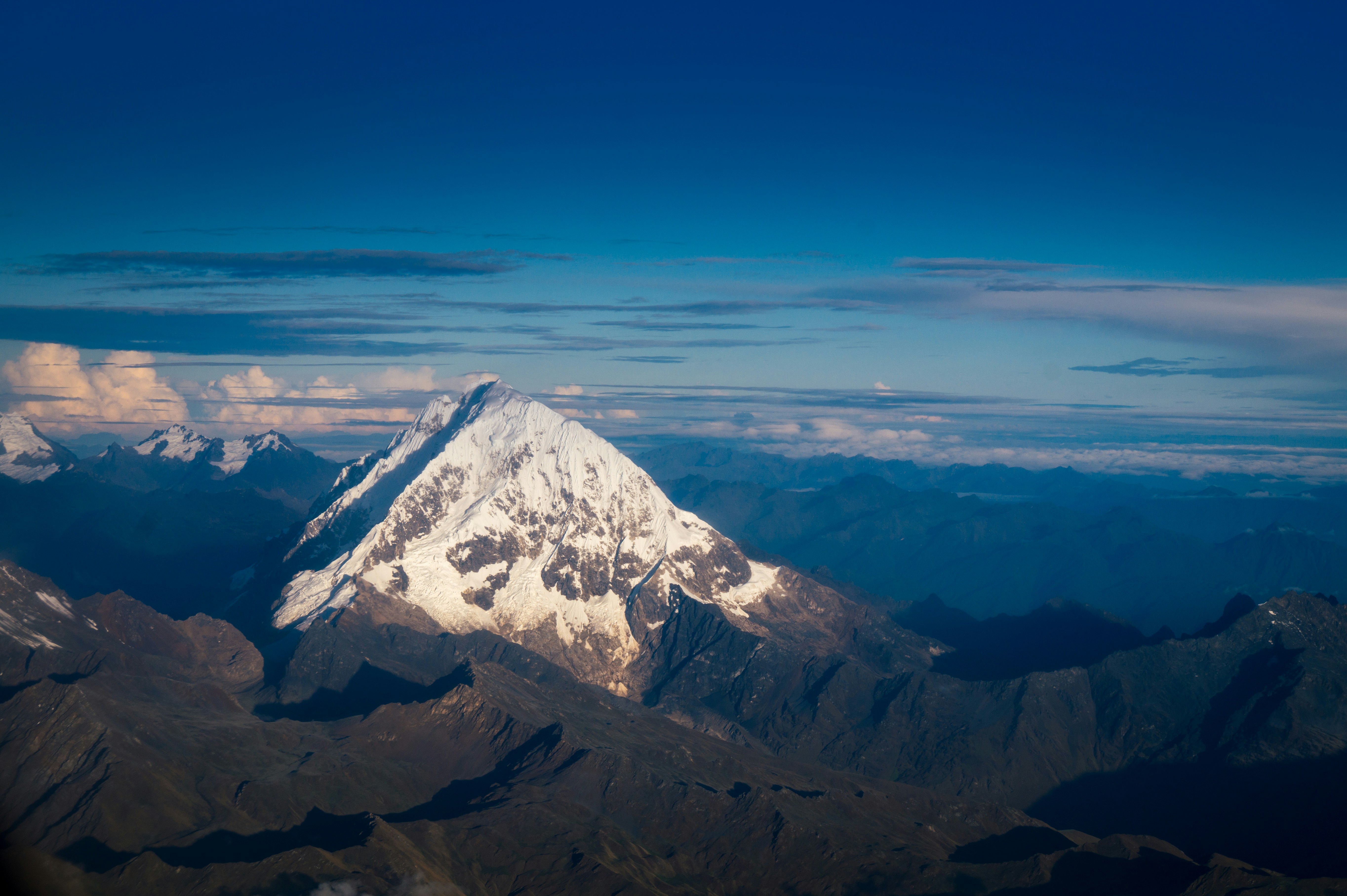 snow covered mountain under blue sky during daytime