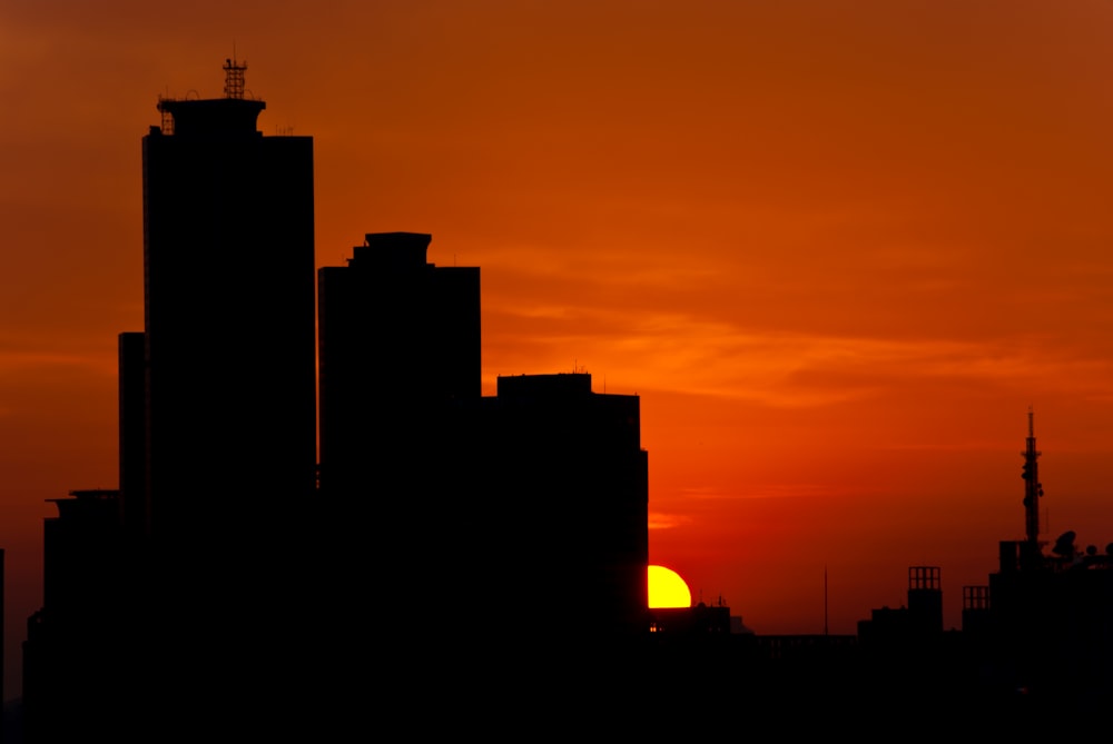 silhouette of building during sunset