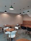 brown wooden table with chairs