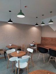 brown wooden table with chairs