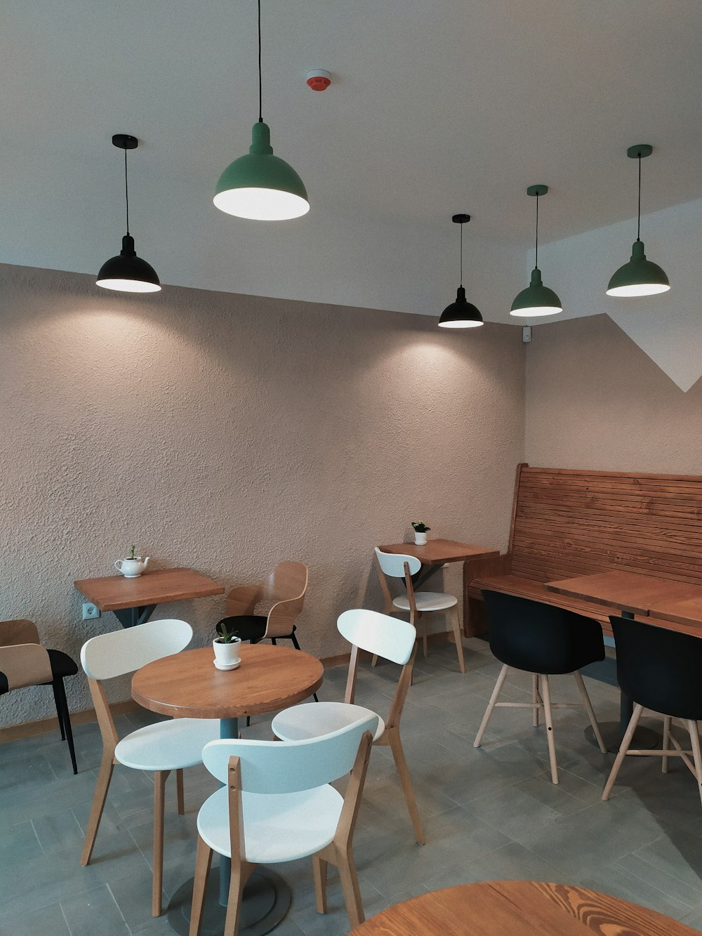 brown wooden table with chairs