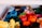 A basket filled with neatly arranged rolls of colorful felt fabric. The fabrics are rolled tightly and organized by color, creating a vibrant and visually appealing display. Shades range from blues and greens to reds, oranges, and yellows.