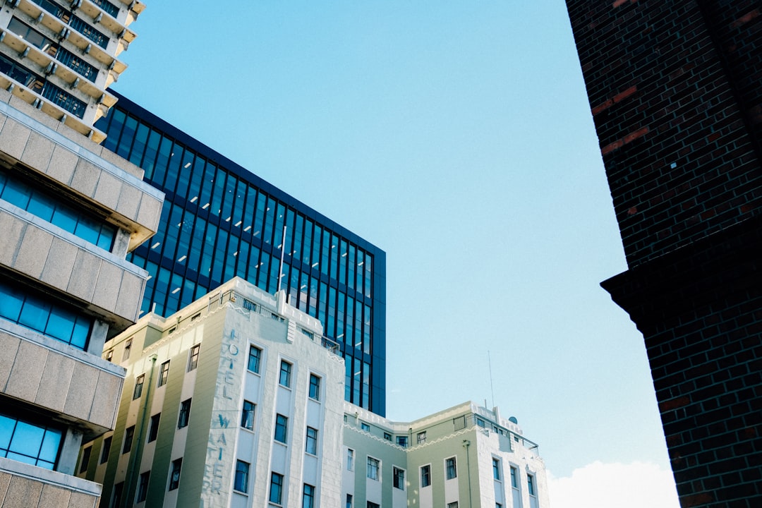 white concrete building under blue sky during daytime