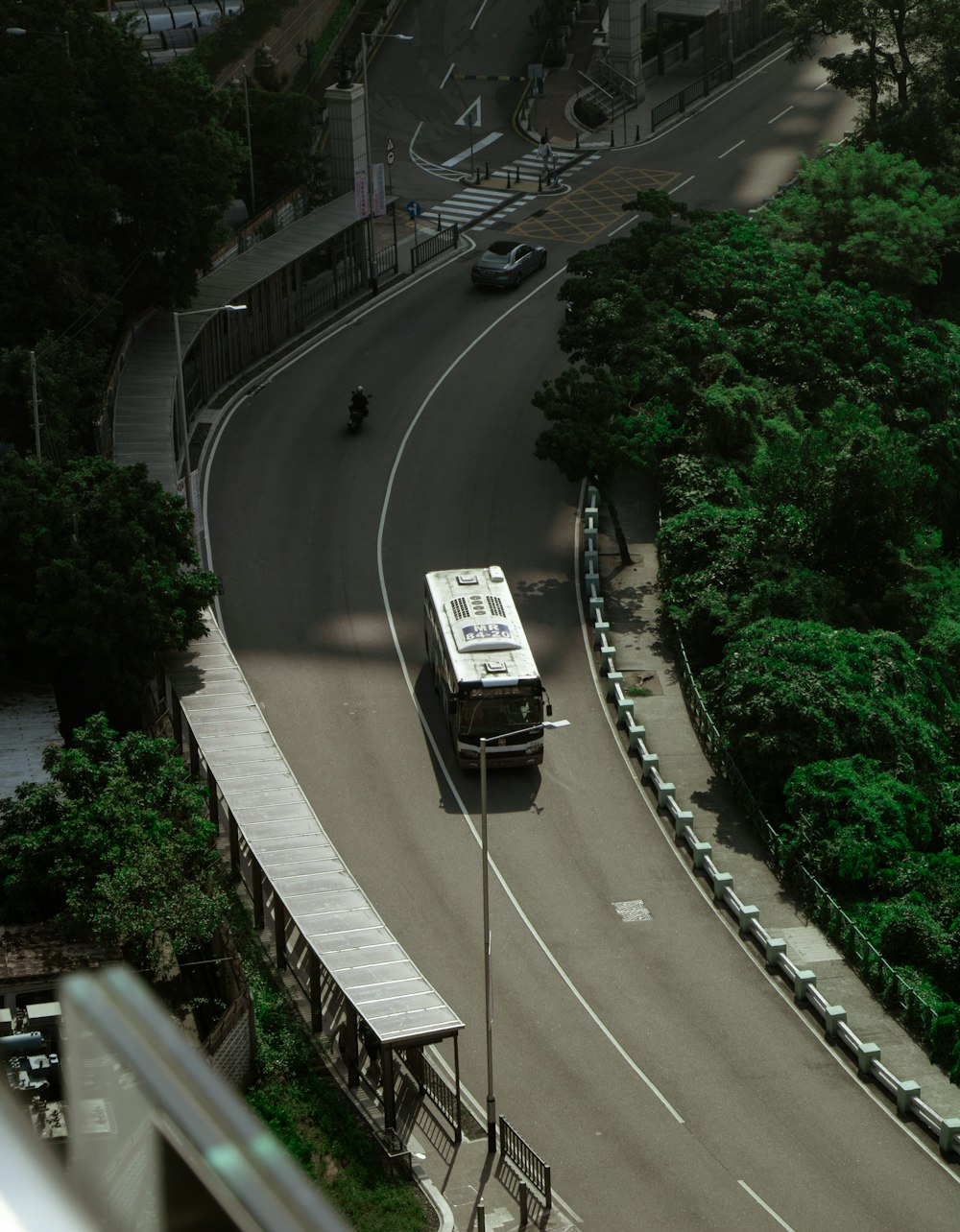 black and white bus on road during daytime