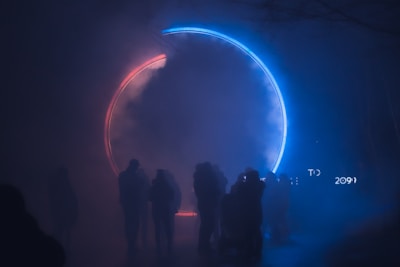 silhouette of people standing on stage