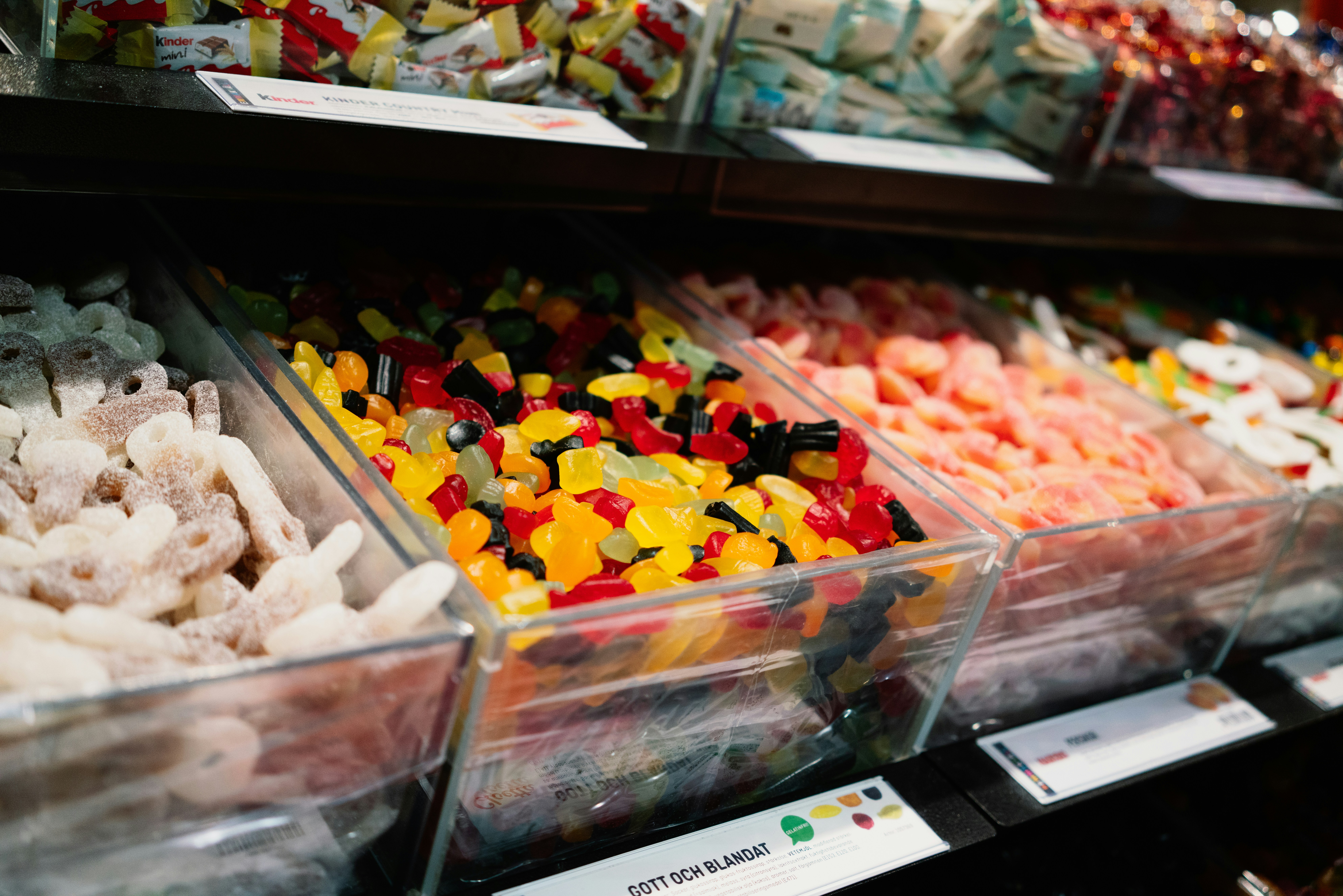 assorted candies in clear plastic container