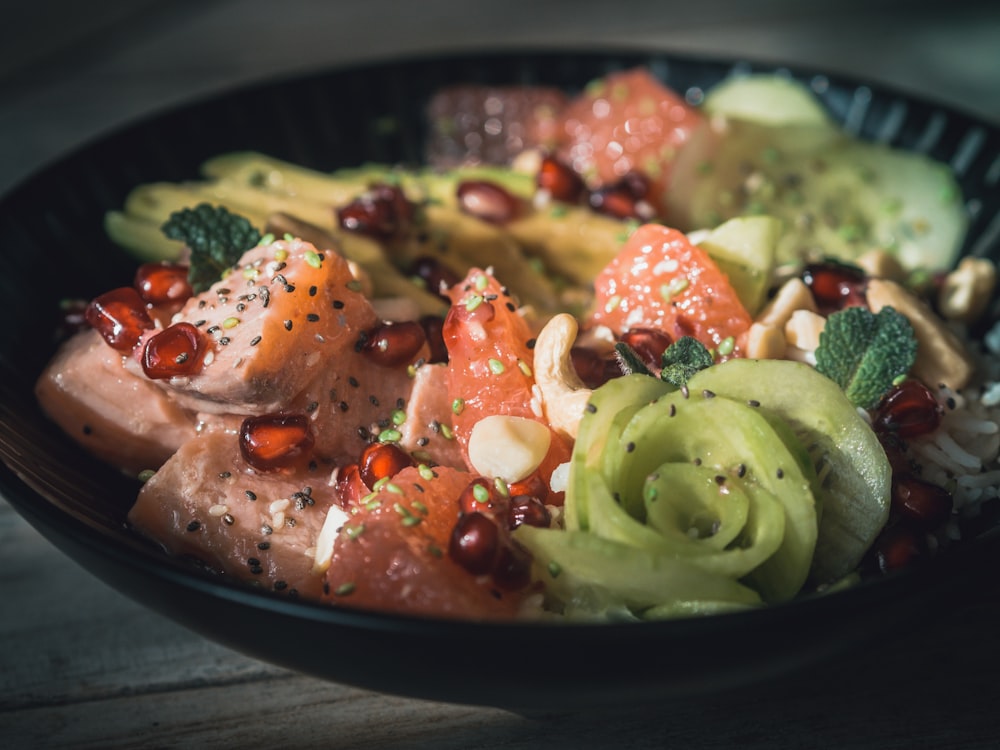 vegetable salad on black ceramic plate