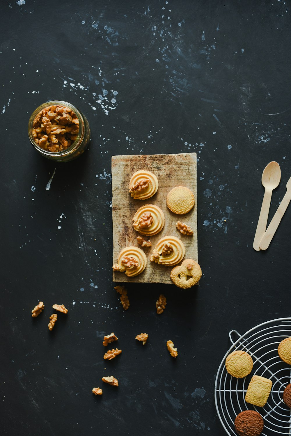 white plastic spoon beside brown round food