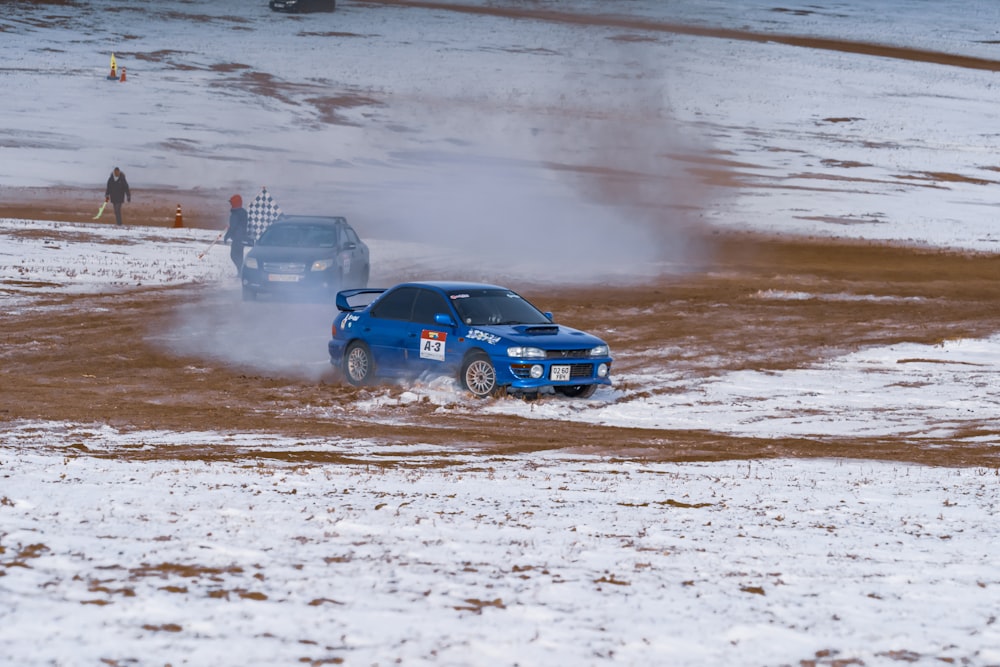 blue audi coupe on water