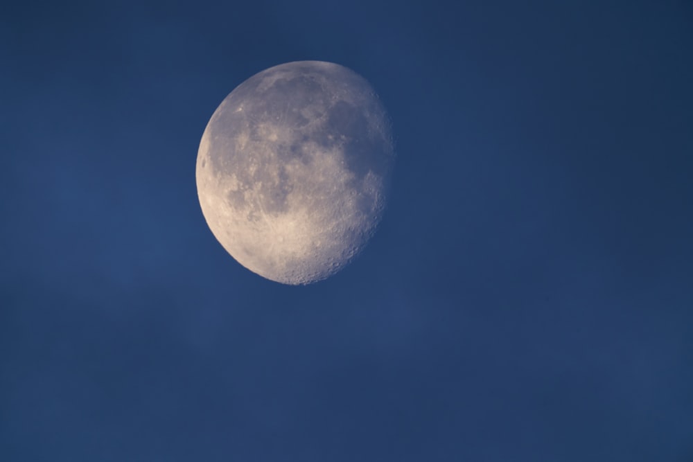 full moon in blue sky