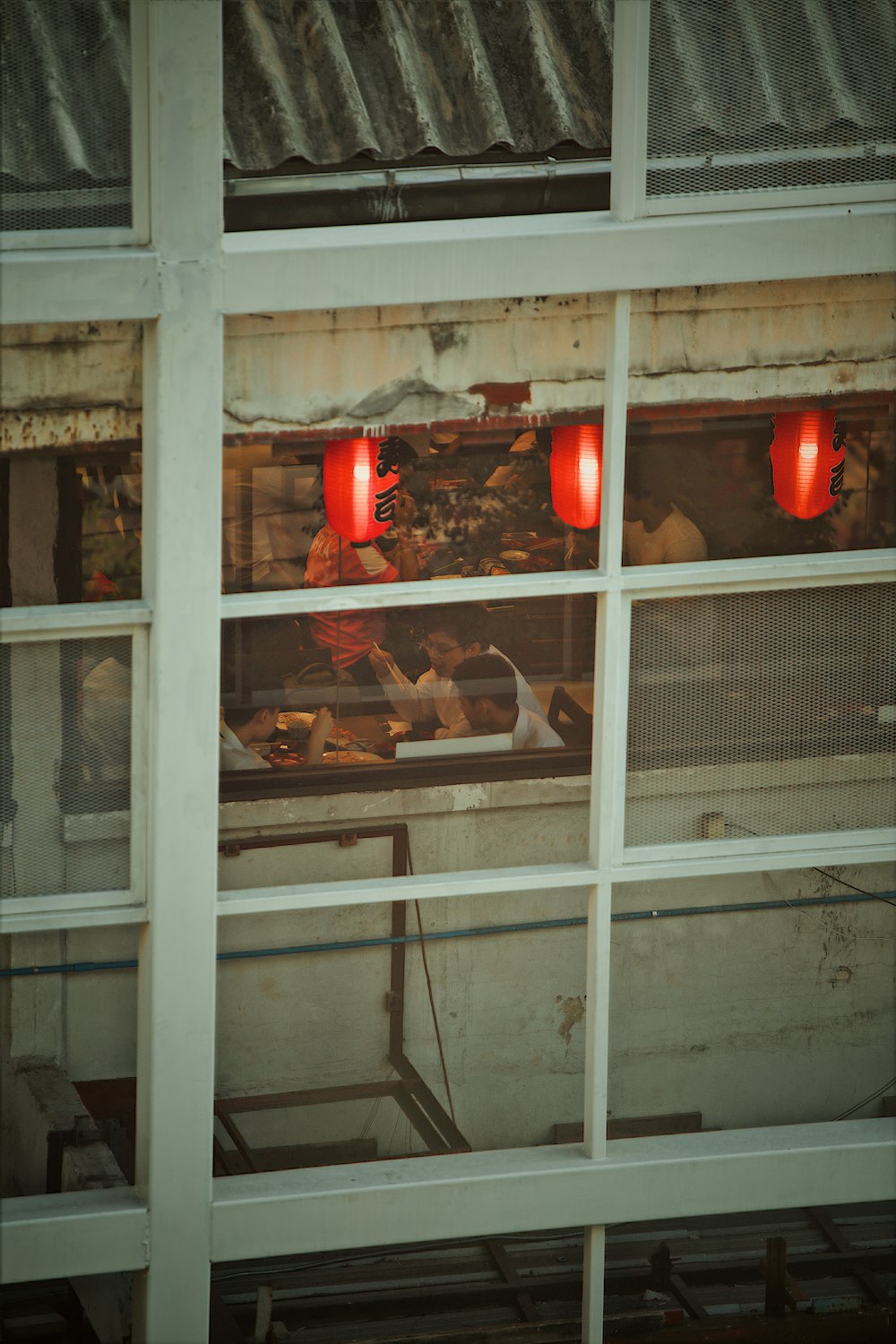 white wooden framed glass window