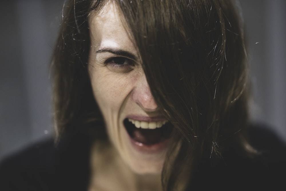 woman with black hair smiling