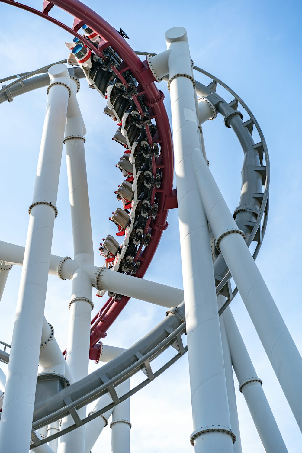 white and red roller coaster rail